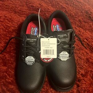 Brand new size 9 sketchers ,memory foam slip, resistant work shoes